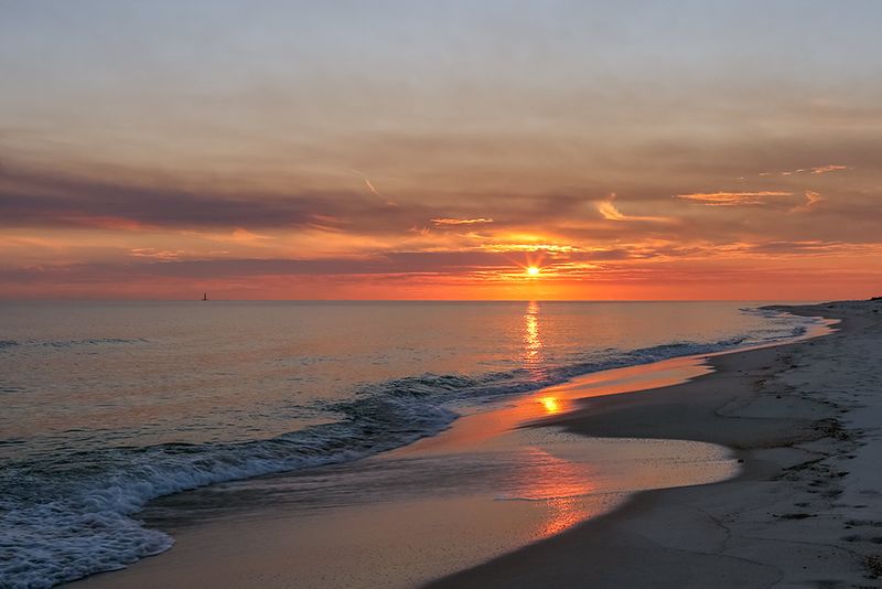 Sunset Over Water In Gulf Shores Alabama Professional Family Beach Photographer