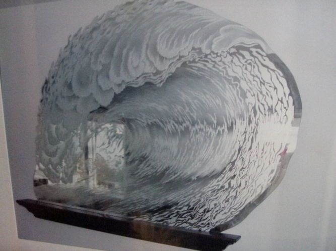 "Surfer dreams " carved, etched wave mirror.  Stunning, original art glass. A perfect barreling left. The top edge of the wave feathering into the wind in flames.
