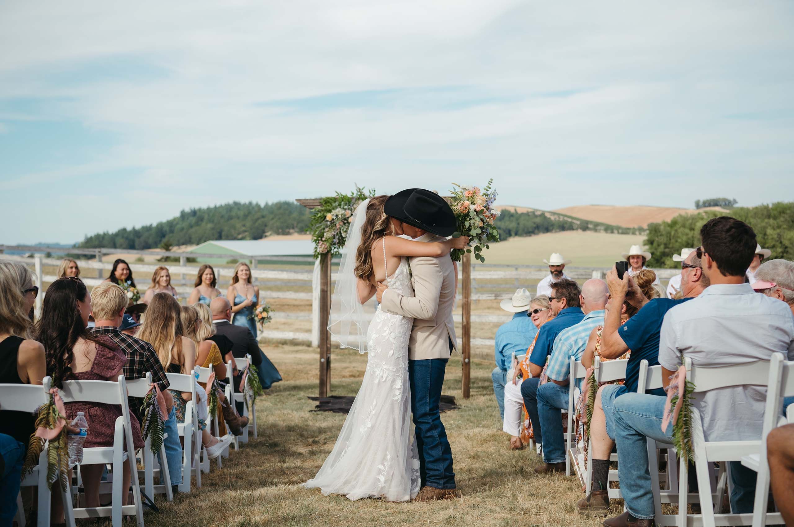 Western wedding ceremony kiss