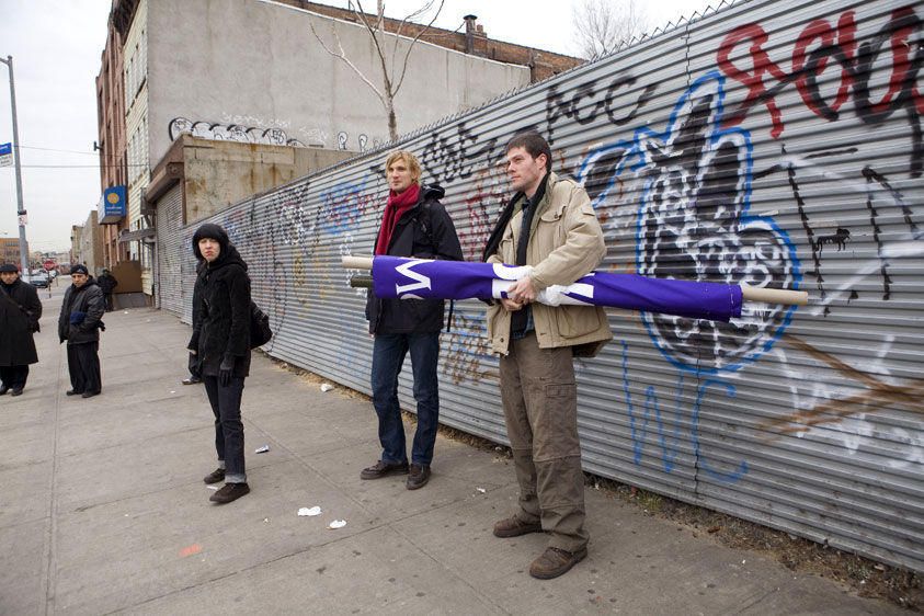 Waiting for the shuttle bus, on the way to a demonstration.