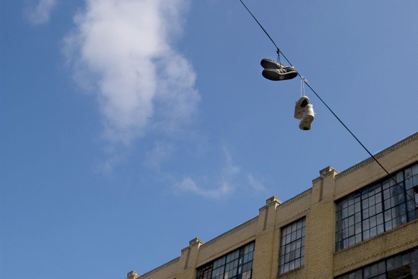 Moore Street Shoes hanging on wire