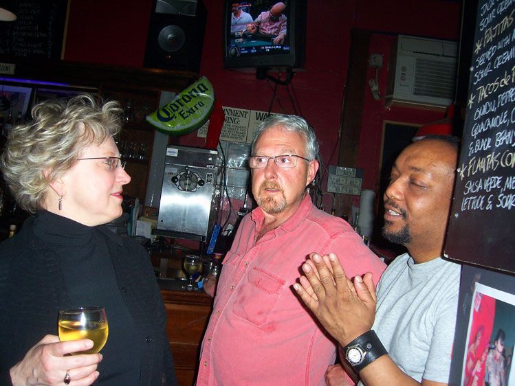 Life Cafe owners Kathy Life and John (center) with a friend.