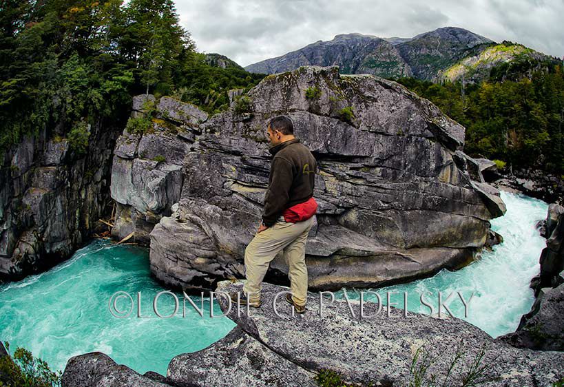 A river guide viewing Zeta Rapid, Futalefu River at Cave Camp, Los Lagos Region, Patagonia, Chile, South America ©Londie G. Padelsky 11SAC_LGP7605_LondieGPadelsky