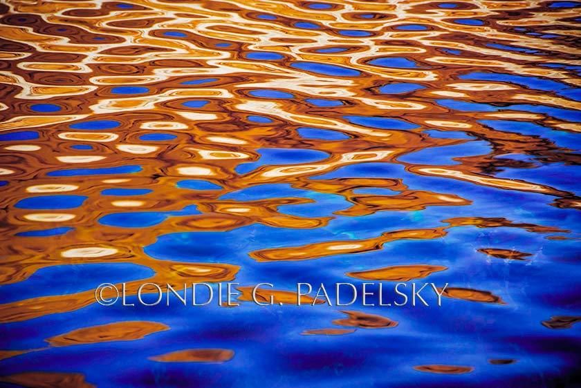 Gold, brown, and blue abstract water reflection.               ©Londie G. Padelsky 0712_UT0499_LondieGPadelsky
