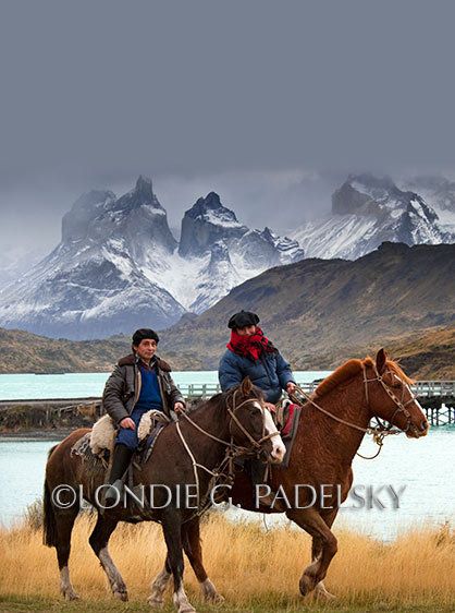 Chilean men riding horses with Torres del Paine in the background, Torres del Paine National Park,Chile, South America           ©Londie G. Padelsky SAMER_09941_LondieGPadelsky