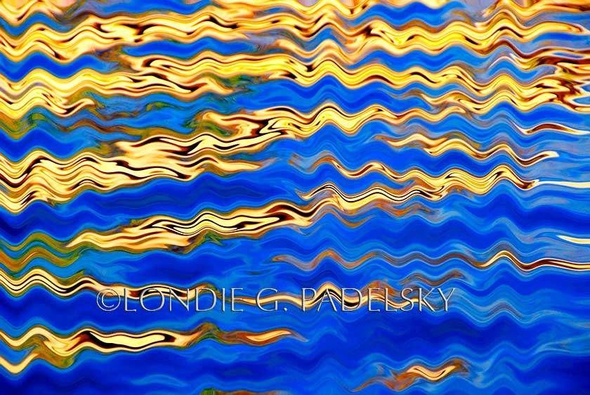 Yellow, blue, brown, and red water reflection and abstract art design. ©Londie G. Padelsky LP12_3292c_LondieGPadelsky