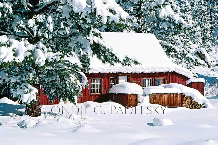 Snow covered red cabin in the Eastern Sierra, California     ©Londie G. Padelsky  ES35-2921_LondieGPadelsky