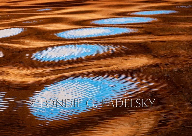 Brown, tan, blue, and white cloud reflection and abstract design.        ©Londie G. Padelsky LP05_1450_LondieGPadelsky
