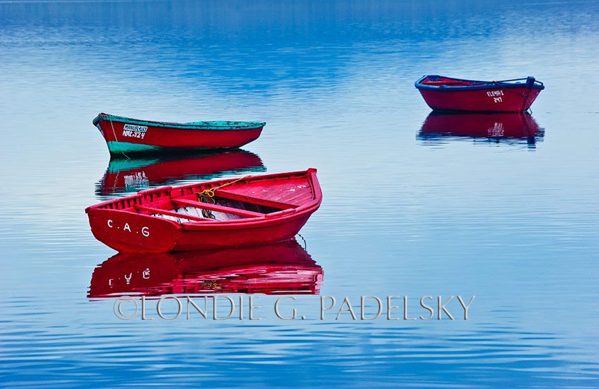 Three red boats, southern Chile, South America               ©Londie G. Padelsky 0510SA_LGP4475-2_LondieGPadelsky