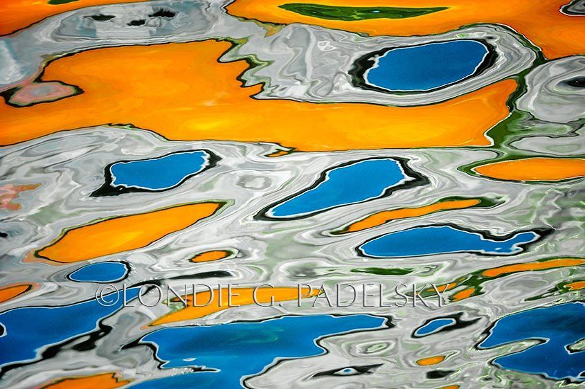 Orange, blue, black, and white water reflection  and abstract design.  ©Londie G. Padelsky CBC_2917b_LondieGPadelsky