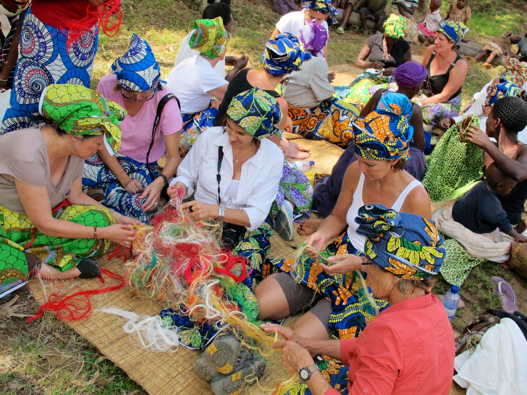 A colorful weaving scene after full day of village work.jpeg