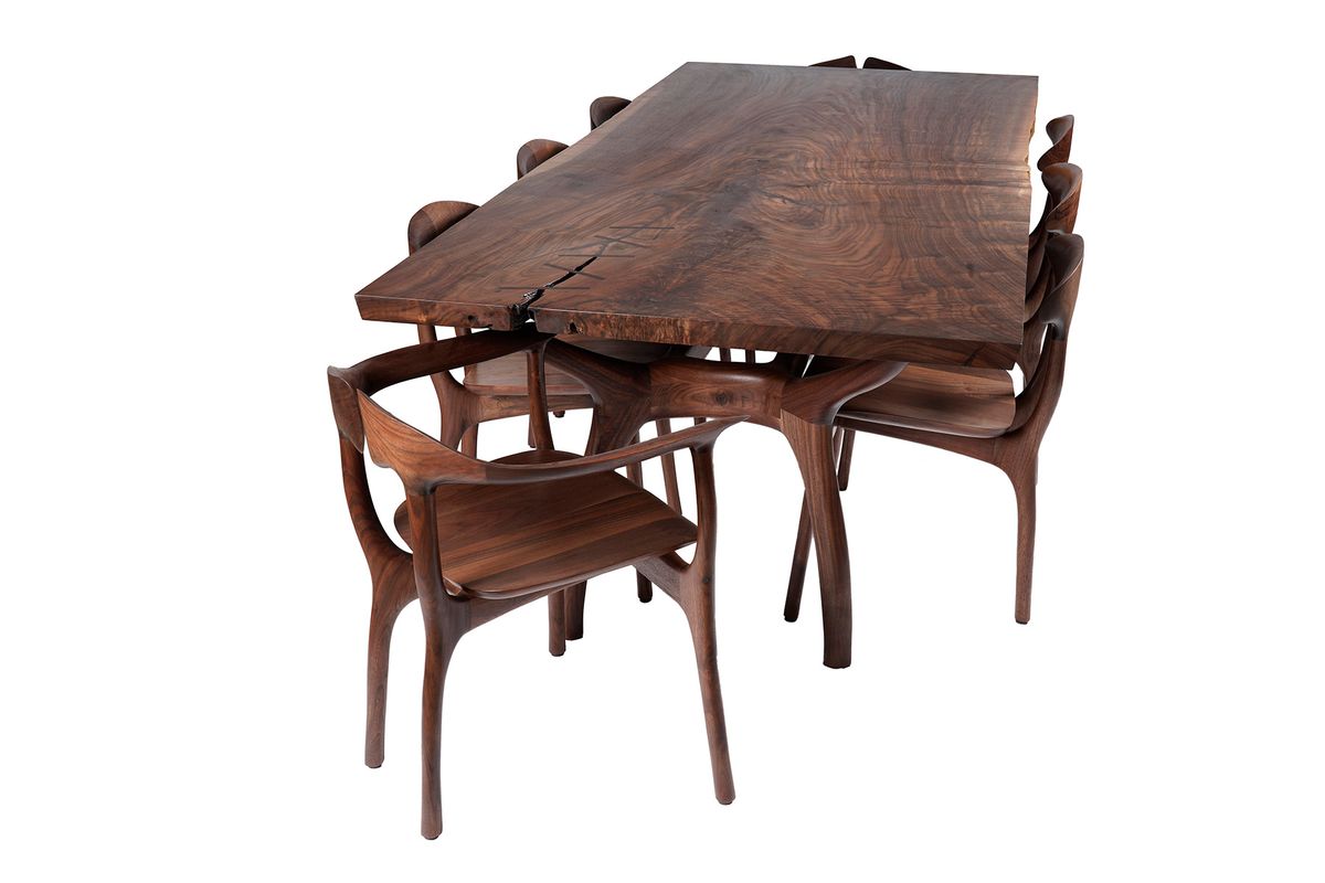 Walnut chairs and table base. Claro walnut slab top. Swallowtail table