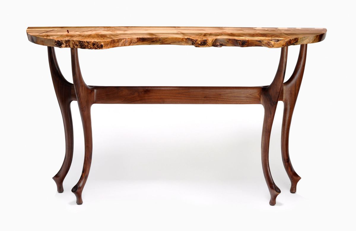 Shown with curly and burled maple top.  Walnut base.  60" wide x 38" high x 16" deep.  Available in a wide array of woods and custom sizes. Pogonia table