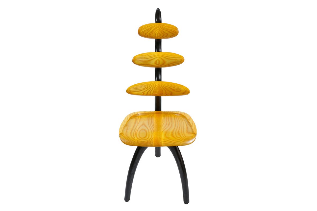 Shown in ebonized ash and ash dyed golden yellow.  18"w x 26"d x 41"h.  Available in a wide array of woods and finish options. Monarch chair