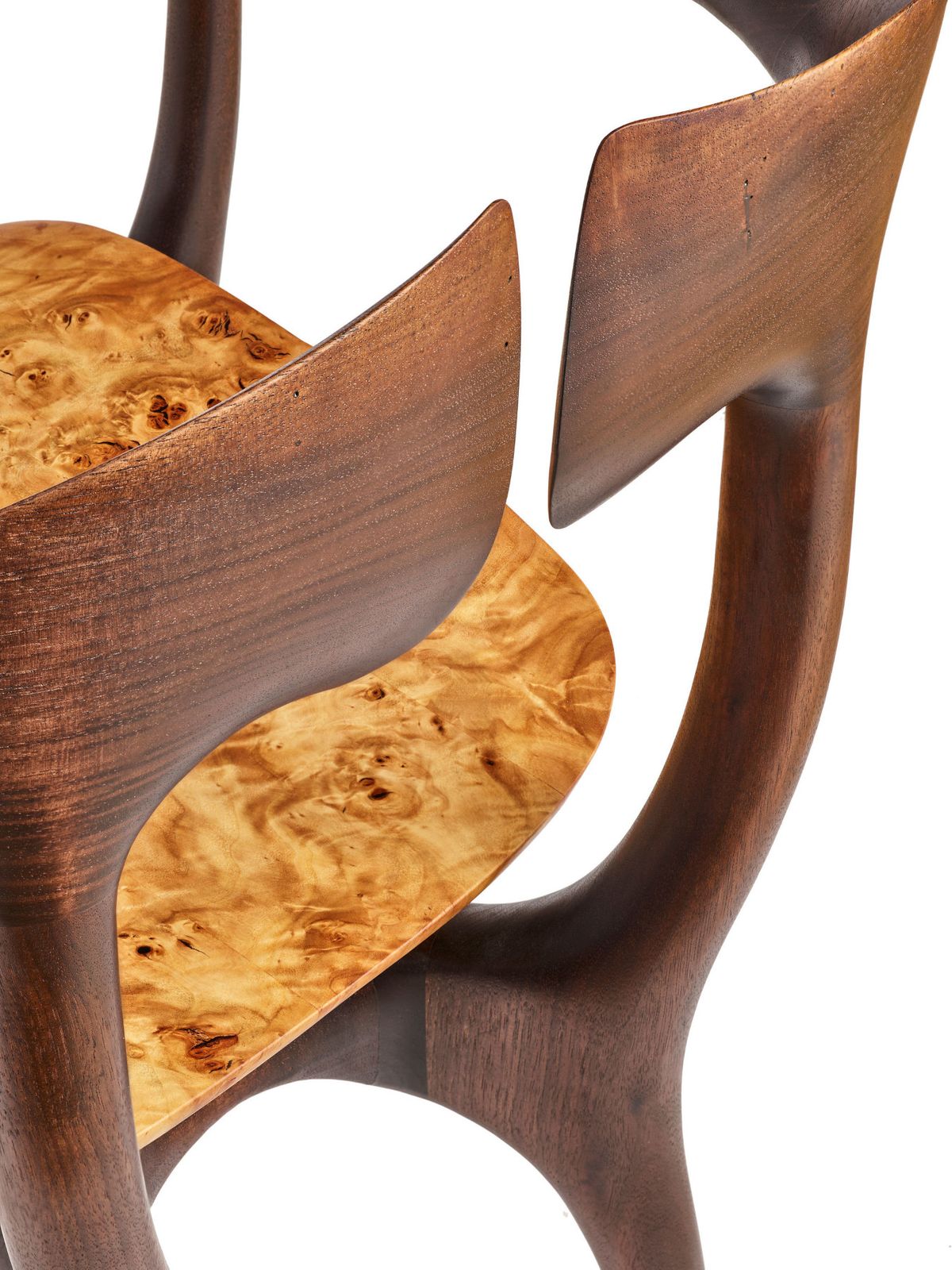 Shown with walnut frame and mappa burl seat. 26" wide x 30" high x 22" deep. Available in a wide array of hardwoods and finish options. Swallowtail chair