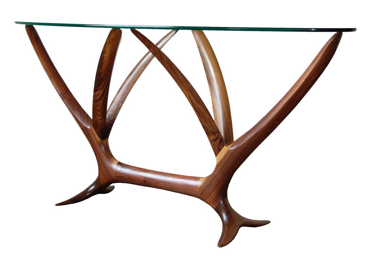 Shown with walnut base and oval glass top.  36" tall, oval top 88" x 22".  Available with glass or wood top.  Available in a wide array of woods, finishes, and custom sizes. Wisteria table