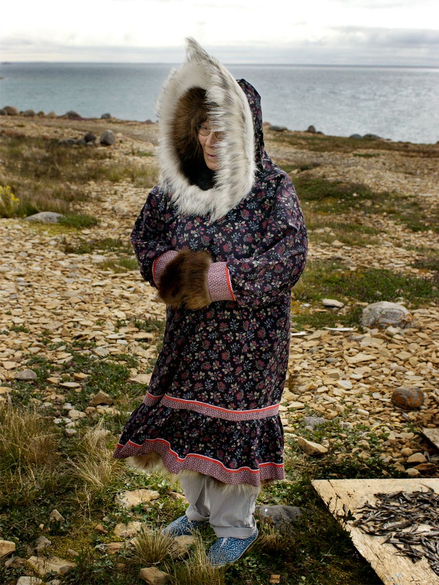 Inuit elder wearing sunburst parka, near Cambridge Bay, Nunavut Inuit elder wearing sunburst parka