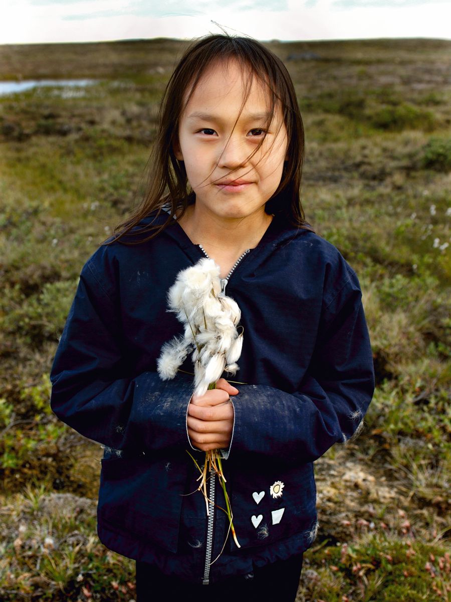 Young girl picking Arctic cotton , tundra, near Cambridge Bay, Nunavut, Arctic photographer, Canadian photographer, location photographer, Storyteller, videographer, Content creator Arctic cotton - Young girl picking Arctic cotton , tundra, near Cambridge Bay, Nunavut