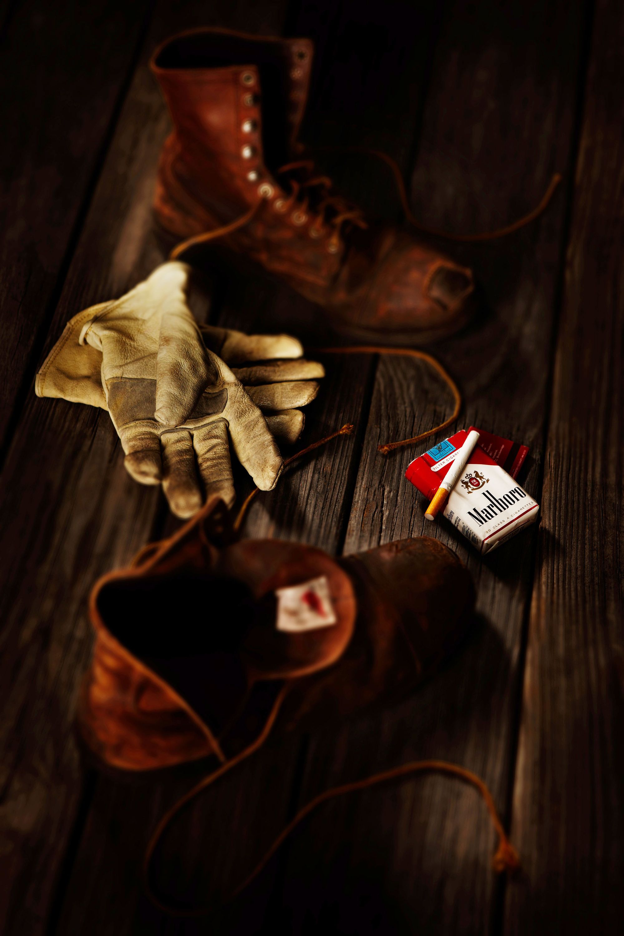 Marlboro cigarettes and work boots