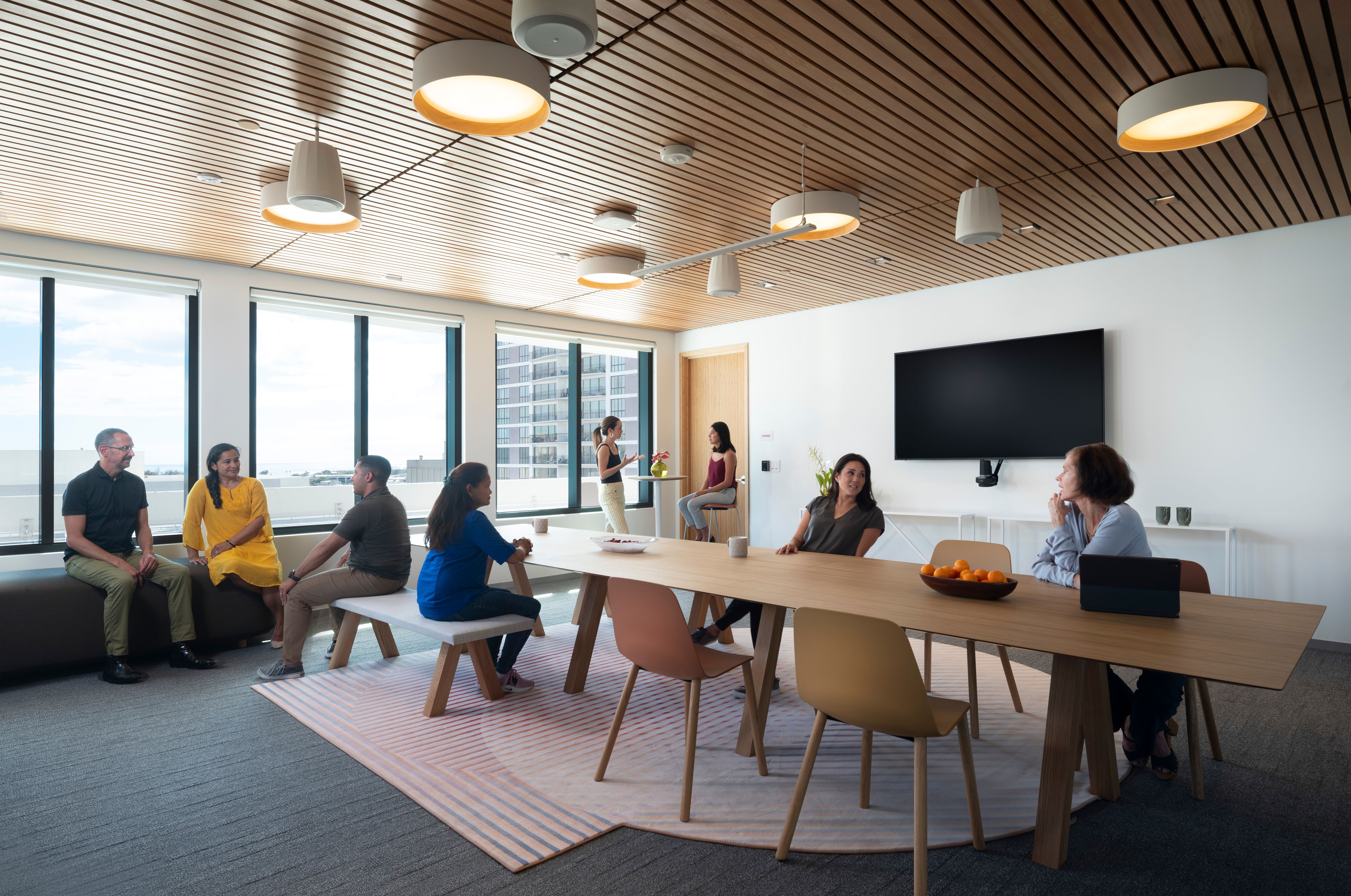 Large conference and workspace with flexible seating located at top floor. Hawaii State FCU Headquarters