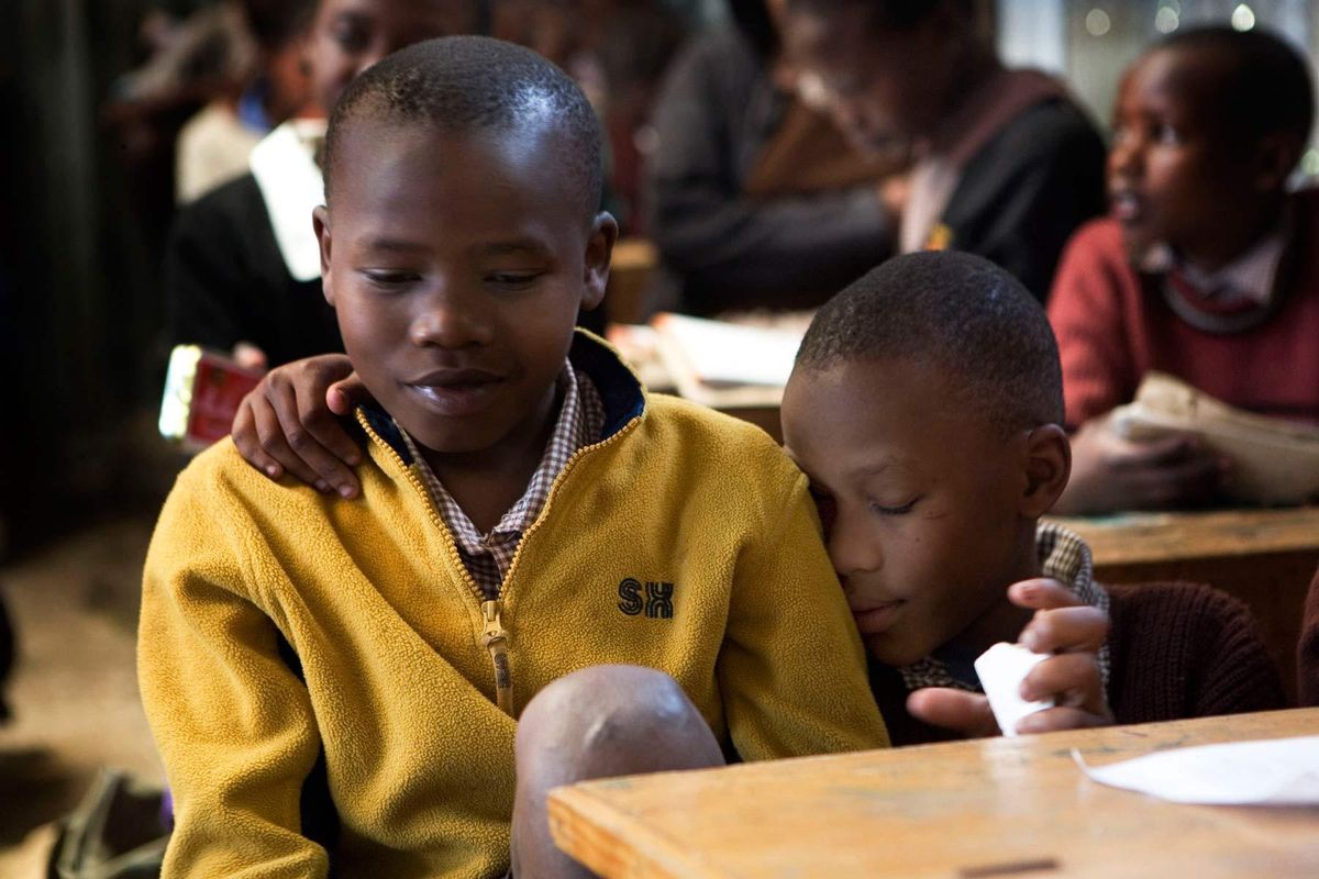 Mutava and Braise together in class five B at St. Catherine's primary School in the Marigoni slums.© Hazel Thompson Carried on friendship