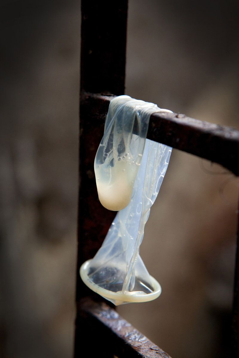 A discarded condom is tossed down and lands on a windowsill in a brothel house on 14th Lane, where Guddi lives and works. An estimated 70% of the women working in Kamathipura are HIV positive and the area has been described as an AIDS time bomb.© Hazel Thompson India Sex Slaves