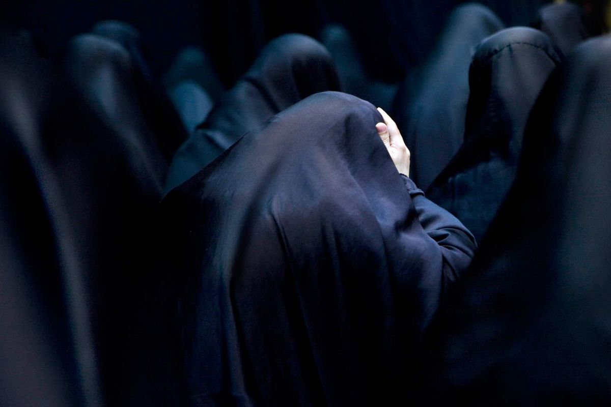 Maryam, Human Resources Co-ordinator aged 41 praying at morning prayers at the Martam in Al Masala village in Bahrain.© Hazel Thompson Measure of a Woman