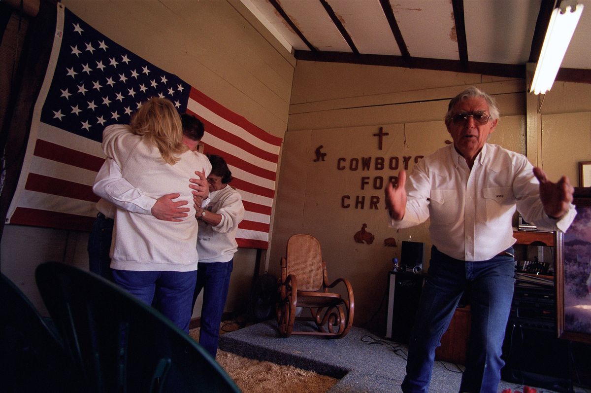 Do you believe? - Pastor David De Arond giving an alter call at the Coyboys for Christ, Barn Church, in Chandler, Oklahoma.© Hazel Thompson Modern Crusaders