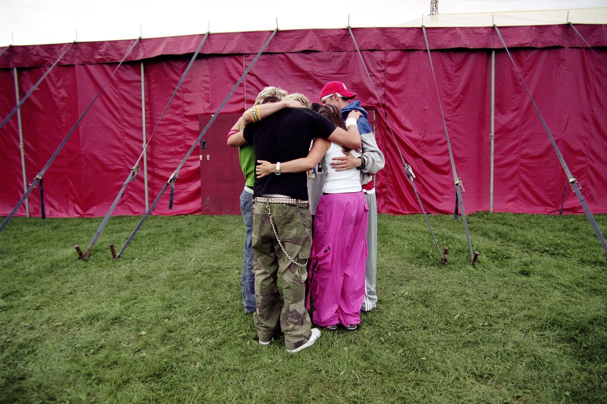 Group Prayer - The Tribe pray together for the evening's performance backstage just before going on stage at Festival Manchester.© Hazel Thompson Modern Crusaders