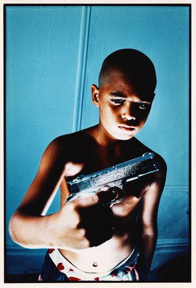 Smiley's brother with a toygun, NY 1985