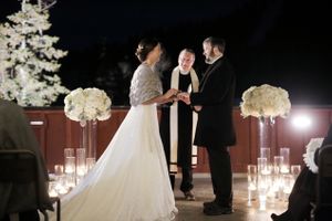 Bride and Groom Exchange Vows - Snow-Frosted Tree Background Ceremony