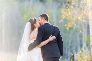Hoopes Events | April and Matt | Legacy Lodge | Park City Mountain Resort | Park City Utah | Bride and Groom Kissing in Field April_Matt_Park_City_Legacy_Lodge_Park_City_Utah_Kissing_in_Field.jpg