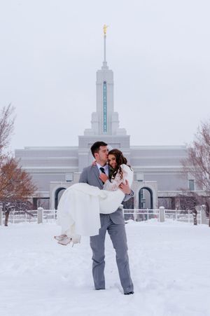Hoopes Events | Shauna and Blake | Northampton House | American Fork Utah | Groom Carrying Bride in Front of Timpanogos Temple Shauna_Blake_Northampton_House_American_Fork_Utah_Groom_Carrying_Bride_Timpanogos_Temple.jpg