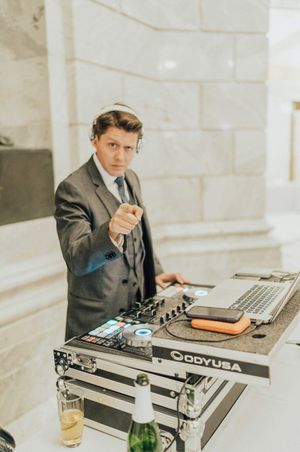 DJ getting ready for the reception Reception