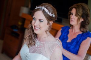 Hoopes Events | Ashley and Dan | Solitude Resort | Solitude Utah | Bride's Mother Helping Bride With Her Dress Ashley_Dan_Solitude_Resort_Solitude_Utah_Brides_Mother_Zipping_Up_Brides_Dress.jpg