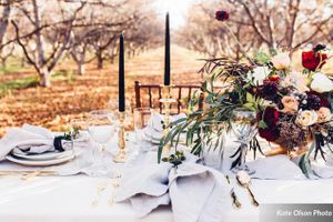 Black Candles with Gold Candlesticks Table Setting