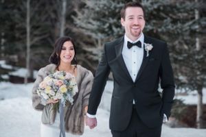 Hoopes Events | Julia and Mark | Silver Lake Lodge | Deer Valley | Park City Utah | Bride and Groom Walking in the Snow at the Ski Resort Julia_Mark_Silver_Lake_Lodge_Deer_Valley_Resort_Park_City_Utah_Smiling_Bride_Groom_Walking_In_Snow.jpg