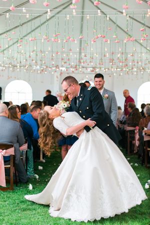 Hoopes Events | Katelyn and David | Park City Utah | Couple Kissing Under a Bistro Light and Carnation Ceiling Katelyn_David_Park_City_Utah_Couple_Kissing_Under_Carnation_Bistro_Light_Ceiling.jpg