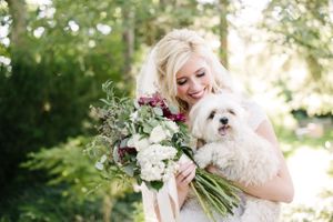 Hoopes Events | Brianne and Braden | Monument Park Stake Center | Salt Lake City Utah | Bride Holding Dog Brianne_Braden_Monument_Park_Stake_Center_Salt_Lake_City_Utah_Bride_Dog.jpg