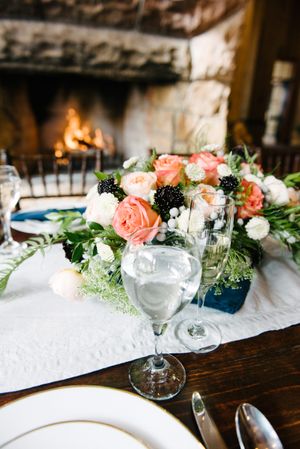 Hoopes Events | Rocky Mountain Bride | Winter Elopement | Deer Valley | Empire Lodge | Park City Utah | Glowing Fire with Coral Floral Centerpiece on Table Rocky_Mountain_Bride_Winter_Elopement_Deer_Valley_Empire_Lodge_Deer_Valley_Resort_Park_City_Utah_Glowing_Fire_Floral_Centerpiece.jpg