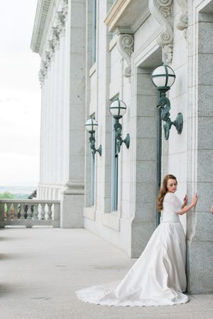 Hoopes Events | Katelyn and David | Park City Utah | Bride Leaning Against Capitol Building Katelyn_David_Park_City_Utah_Bride_Capitol_Building.jpg