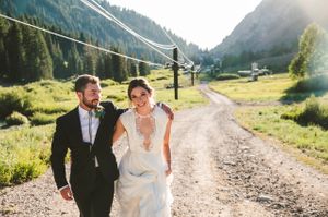 Walking Along Road Bride and Groom