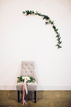 Hoopes Events | Modern Industrial Shoot | The Historic Startup Building | Provo Utah | Comfortable Chair with Simple Greenery Backdrop Modern_Industrial_Wedding_Shoot_The_Historic_Startup_Building_Provo_Utah_Comfortable_Chair_Simple_Greenery.jpg