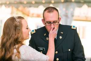Hoopes Events | Katelyn and David | Park City Utah | Bride and Groom Feeding Each Other Wedding Cake | Don't Get it on the Uniform! Katelyn_David_Park_City_Utah_Bride_Groom_Feeding_Each_Other_Cake.jpg