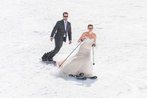 Hoopes Events | Ilana and Dave | Canyons Resort | Park City Utah | Fun Picture of Bride and Groom Skiing/Snowboarding in Wedding Dress and Suit Ilana_Dave_Canyons_Resort_Park_City_Utah_Fun_Bride_Groom_Skiing_in_Wedding_Dress_Suit.jpg