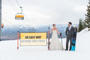 Ilana_Dave_Canyons_Resort_Park_City_Utah_Bride_Groom_No_Easy_Way_Sign_on_Ski_Slopes.jpg