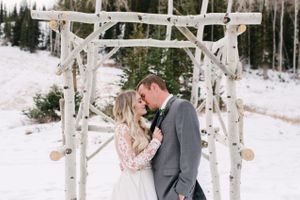 Hoopes Events | Rocky Mountain Bride | Winter Elopement | Deer Valley | Empire Lodge | Park City Utah | Bride and Groom Kiss in Front of Aspen Arch Rocky_Mountain_Bride_Winter_Elopement_Deer_Valley_Empire_Lodge_Deer_Valley_Resort_Park_City_Utah_Bride_Groom_Kiss_Aspen_Arch.jpg