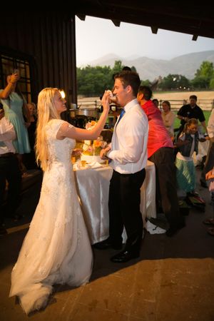 Hoopes Events | Tori and Sterling | Quiet Meadow Farms | Mapleton Utah | Bride and Groom Feed Each Other Wedding Cake Tori_Sterling_Quiet_Meadow_Farms_Mapleton_Utah_Bride_Groom_Feeding_Each_Other_Wedding_Cake.jpg