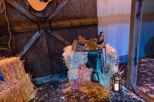 Hoopes Events | The Local Pages | 2017 | Infinity Event Center | Salt Lake City Utah | Saddle on Hay Bale The_Local_Pages_2017_Infinity_Event_Center_Salt_Lake_City_Utah_Saddle_Hay_Bale.jpg