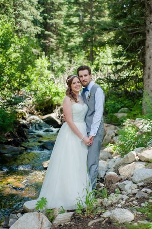 Hoopes Events | Ashley and Dan | Solitude Resort | Solitude Utah | Bride and Groom Embracing Beside Mountain Stream Ashley_Dan_Solitude_Resort_Solitude_Utah_Bride_Groom_Embracing_Beside_Mountain_Streem.jpg